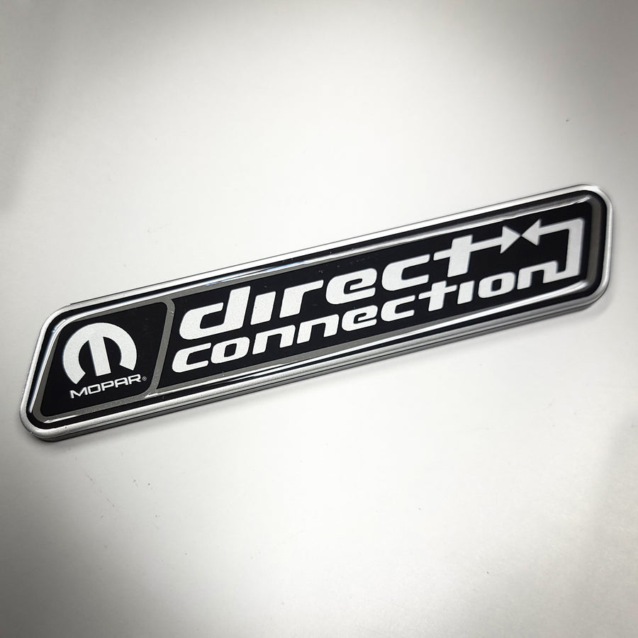 Direct Connection Black Metallic Fender Badge